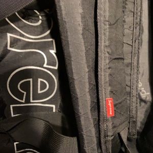 New black supreme duffle bag
